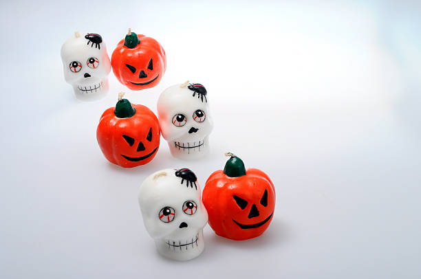 istock Halloween pumpkins and skulls 612231234