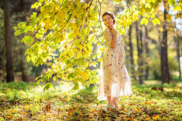 istock Pregnant female in autumn 612232772