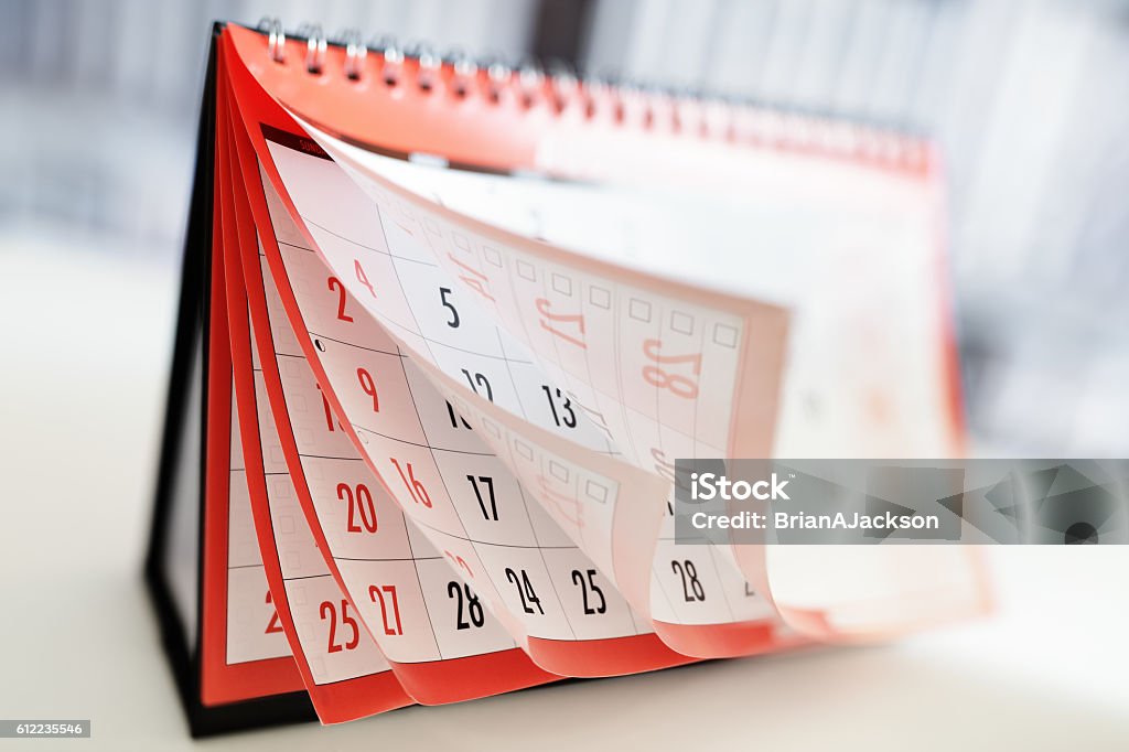 Calendar Months and dates shown on a calendar whilst turning the pages Calendar Stock Photo