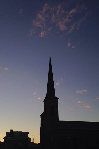 istock Church top in a small town. 612236936