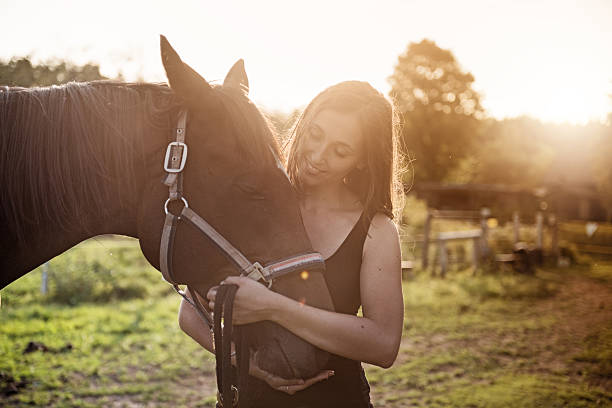 istock Woman with her horse 612238082