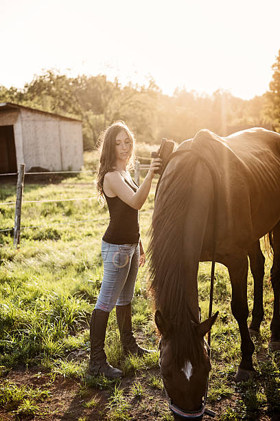istock Woman with her horse 612238144