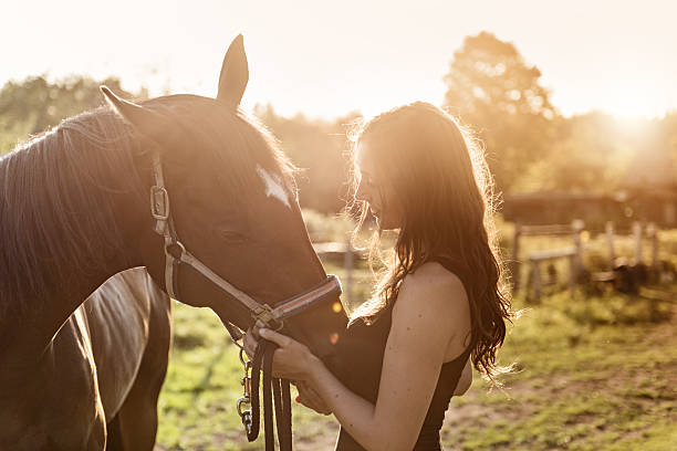 istock Woman with her horse 612238218