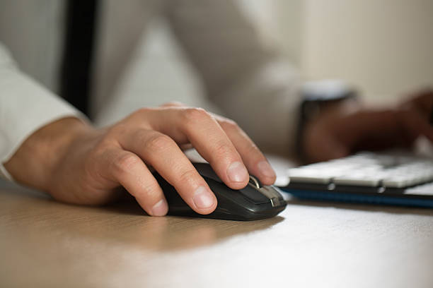 istock Hand of businessman use computer mouse and typing, partnership a 612239500