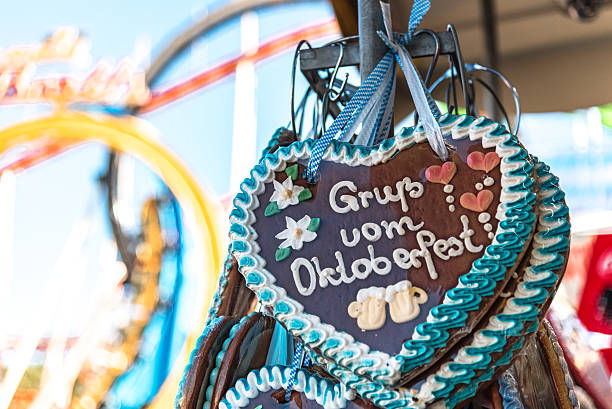 istock octoberfest gingerbread hearts hanging at stall 612239680