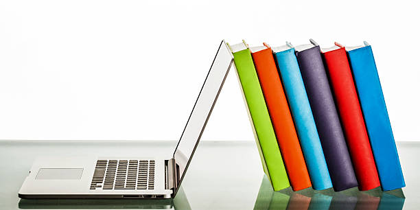 istock Laptop and books 612241474