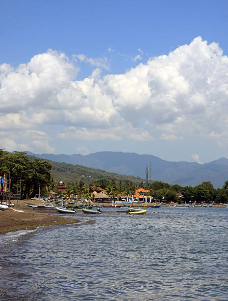 istock Lovina Beach in Bali, Indonesia 612242400