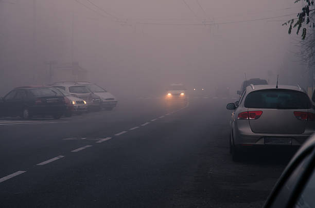 istock road in fog 612242692