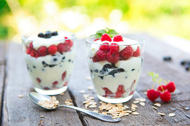 istock Natural yogurt with fresh raspberries, black currant and muesli. 612243010