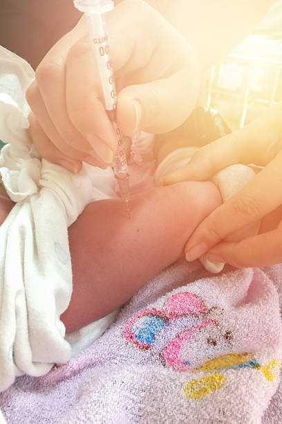 istock Vaccinating A Newborn Baby 612243170