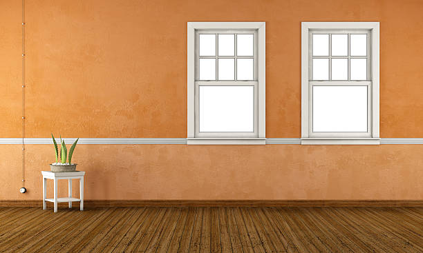 istock Retro living room with double hung windows - 3d rendering 612243348