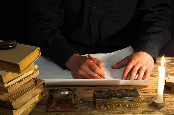 istock Man writing a letter with quill and sealing. Vintage 612243684