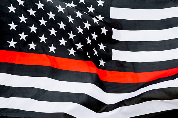 istock Thin Red Line American Flag Honoring Firefighters 612245698