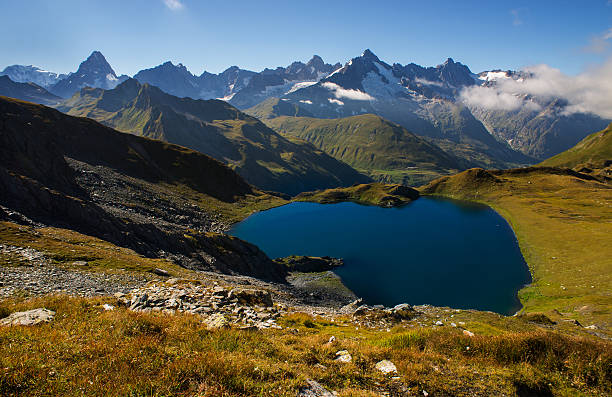 istock Swiss lake and mountains 612246694