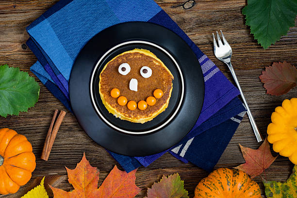 istock Pumpkin pancakes for Halloween breakfast 612247248