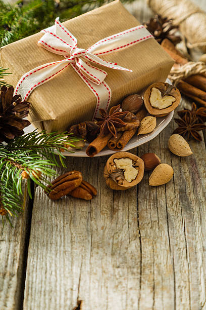 istock Christmas preasent nuts cinnamon ribbon 612247784