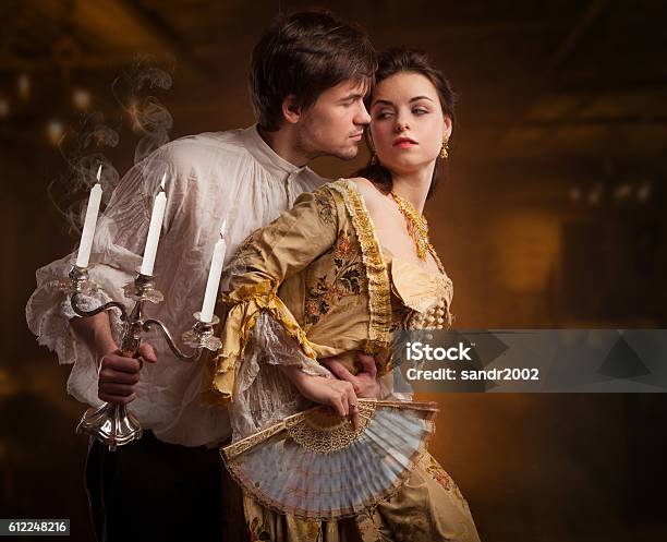 Beautiful Couple Of Vampires Dressed In Medieval Clothing Stock Photo - Download Image Now