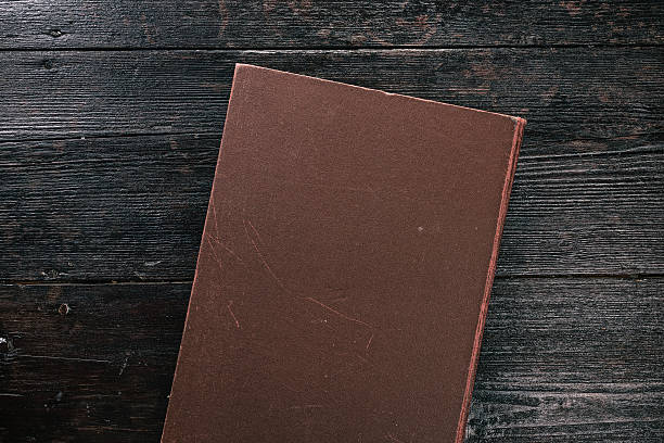 istock Map book on the dark wood 612248496