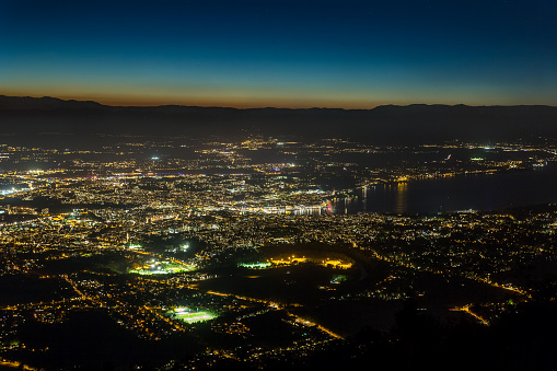 Aerial view of the city of Geneva at night, Switzerland.