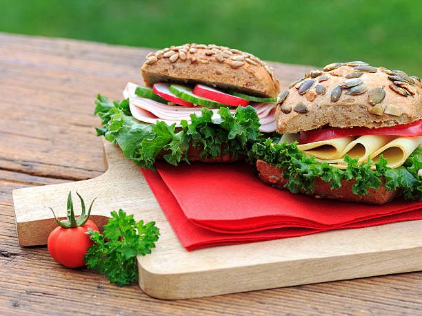 panini - mozzarella tomato sandwich picnic foto e immagini stock
