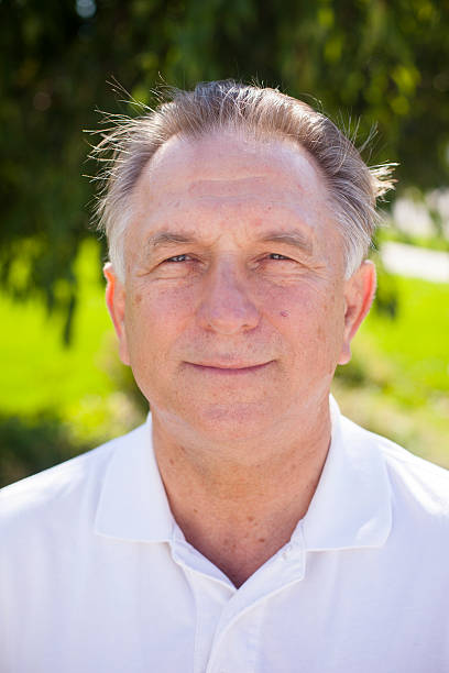 istock Happy Healthy Senior Man Portrait 612253336