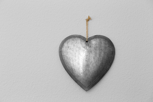 Metal heart on the wall