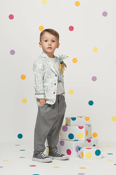 istock little boy in a suit 612254902