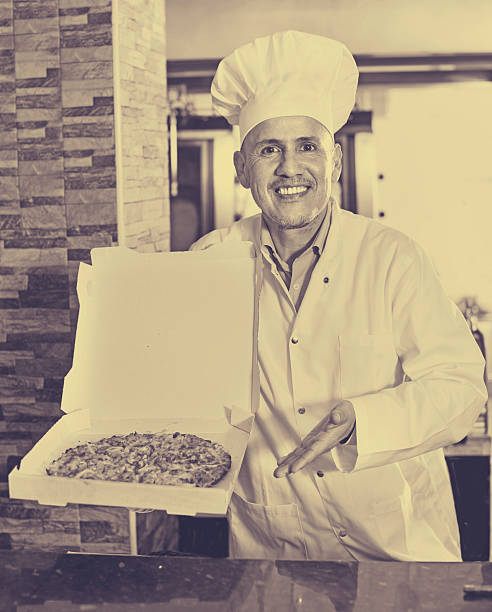 3D Illustration of a Culinary Expert. A male chef runs to the right holding a plate of food, while his other hand is raised with the index finger outstretched. Male Chef