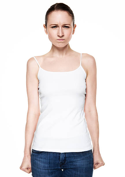 istock Young woman sad and angry having problem on white 612256476