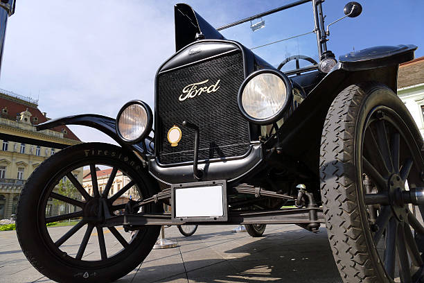 Ford Model T from 1921 parked in the town square Zrenjanin;Vojivodina;Serbia-September 07,2016.Ford Model T from 1921 parked in the town square at the exhibition of old cars in Zrenjanin-Serbia as the first series production car by Ford Motor Company. model t ford stock pictures, royalty-free photos & images