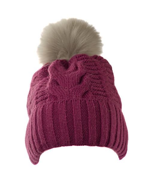 istock Women's knitted hat with pompom isolated on white background 612261546