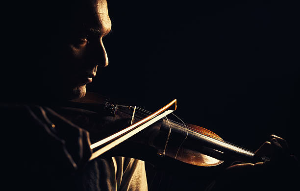istock Act of a Violin Player 612262938