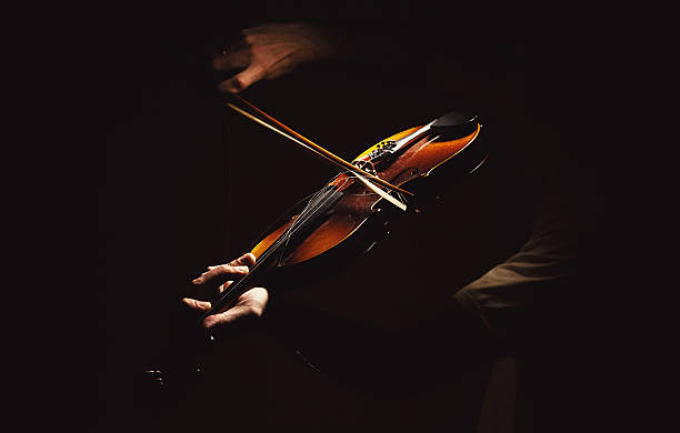 istock Act of a Violin Player 612263132