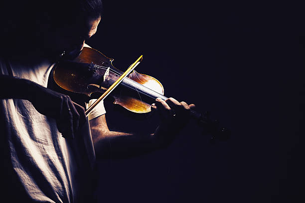 istock Act of a Violin Player 612263168