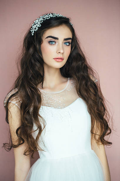 istock Beautiful girl with flower wreath 612263852