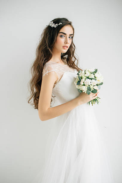 istock Beautiful girl with flower wreath 612263902