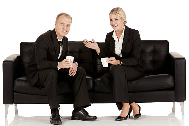 istock Smiling businesswomen discussion 612264710