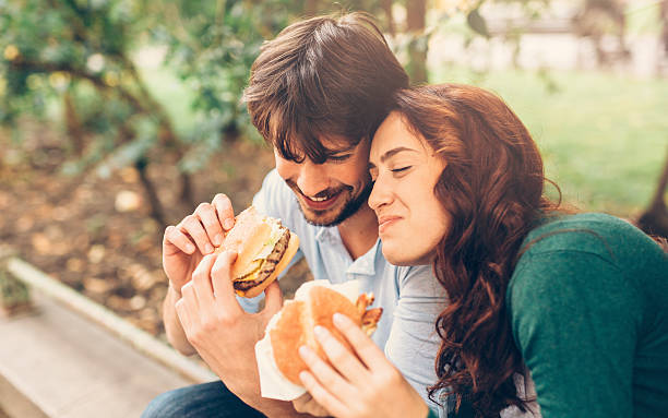 istock Happy couple eating 612264764