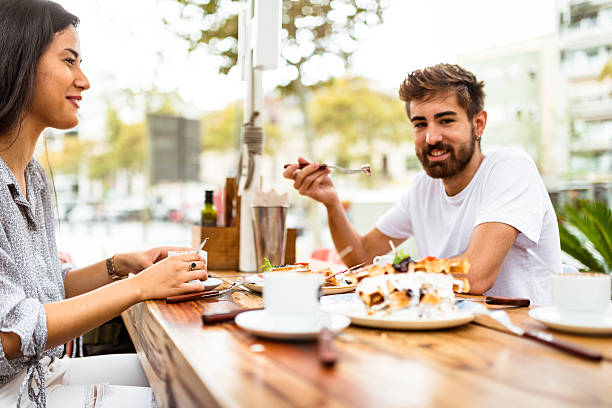 istock friends doing breakfast at the cafe 612265360