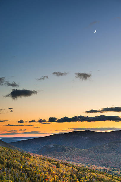 istock Crescent Moon Over Mountains at Sunset in Fall 612265466