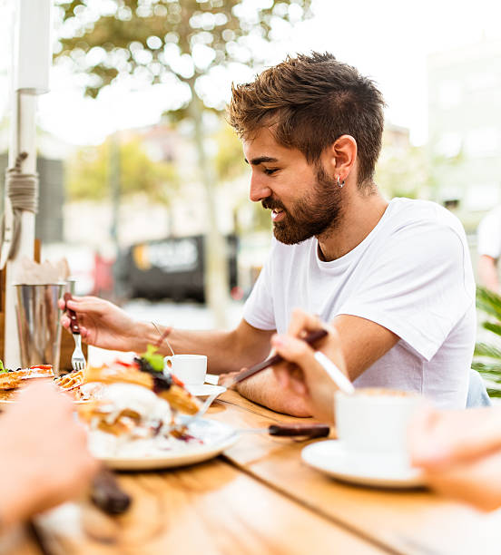 istock friends doing breakfast at the cafe 612265698