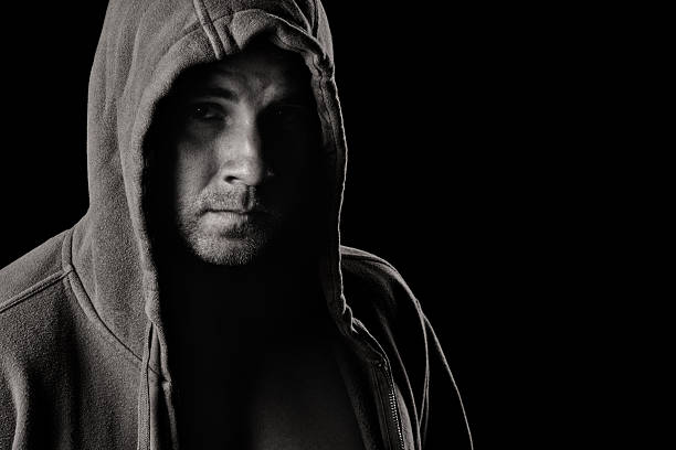 istock Mysterious Man Wearing a Hooded Sweatshirt 612265804