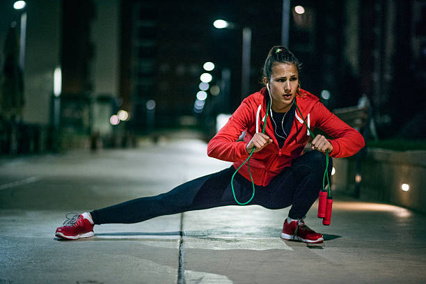 istock Woman exercising and stretching 612267572