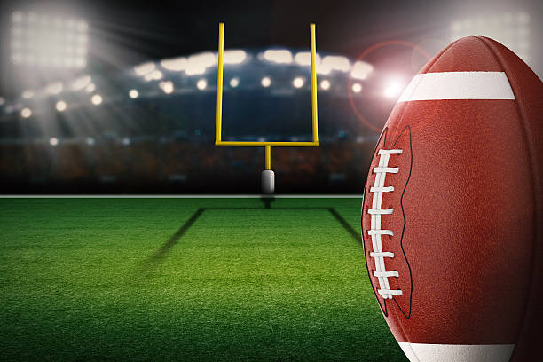 football on field 3d rendering american football ball with field goal post goal post stock pictures, royalty-free photos & images