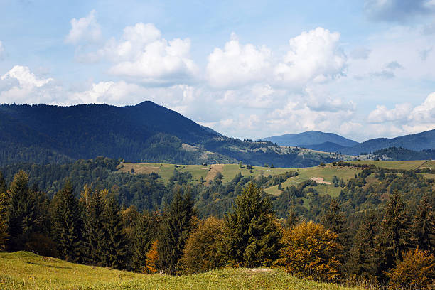 istock Autumn mountain landscape with blue sky with clouds 612373630