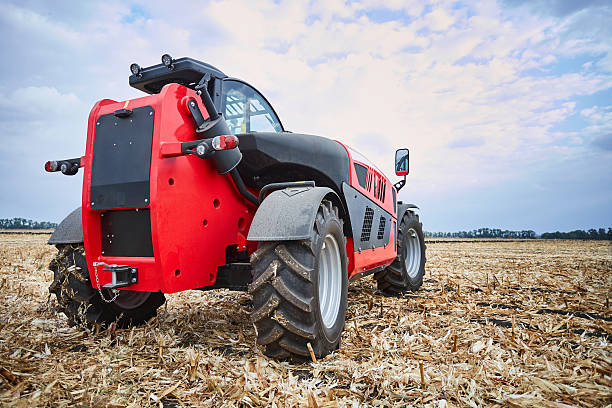 istock Agricultural machinery work in the field 612375788