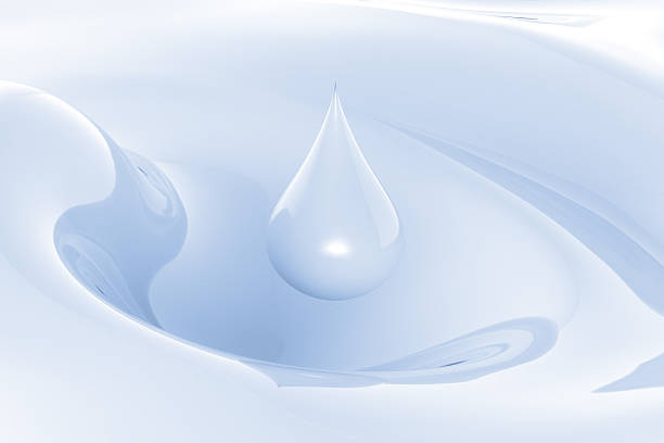 istock droplet of blue milk 612376078