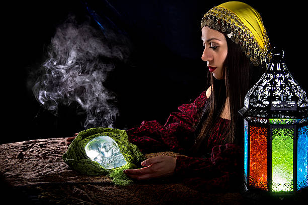 istock Psychic Holding a Crystal Skull 612377238