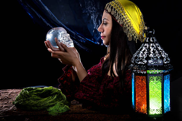 istock Psychic Holding a Crystal Skull 612377454