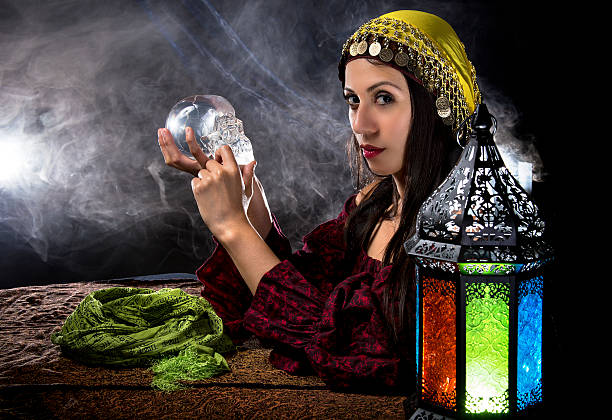 istock Psychic Holding a Crystal Skull 612377656